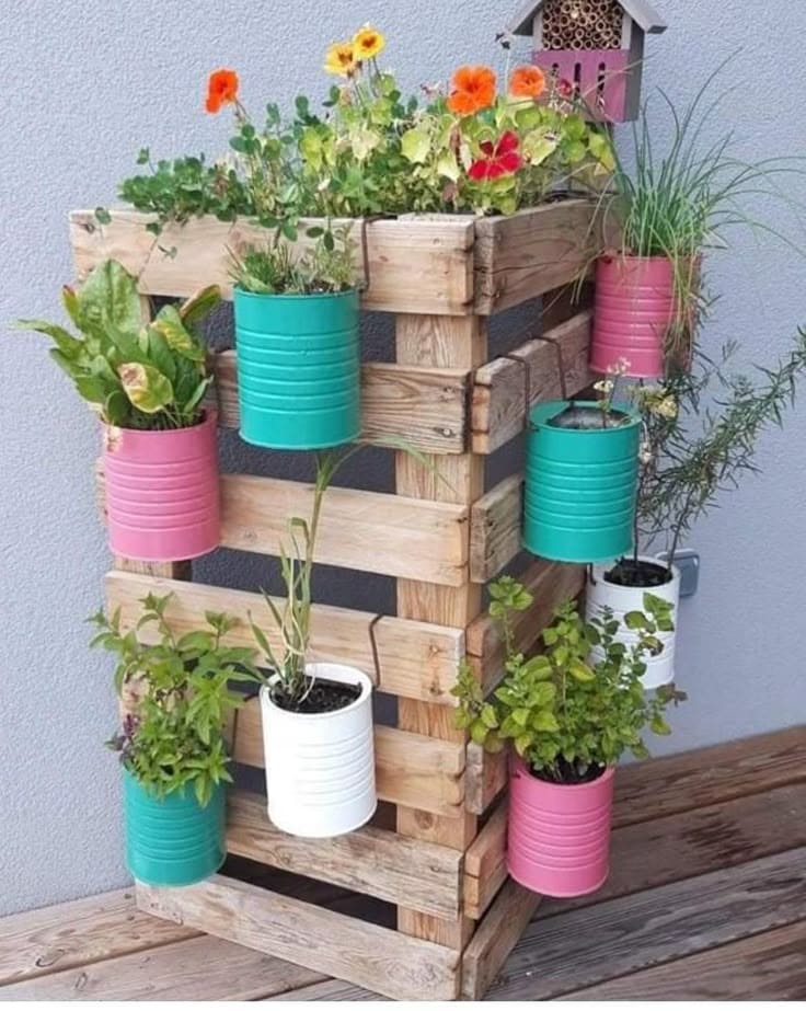 Rustic Pallet Herb Garden with Colorful Tins