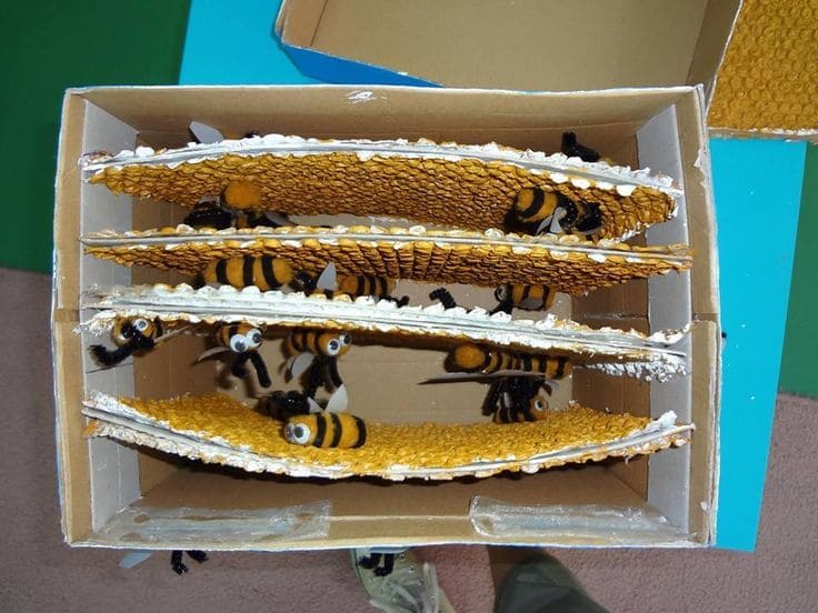 Creative Cardboard Beehive with Playful Bees