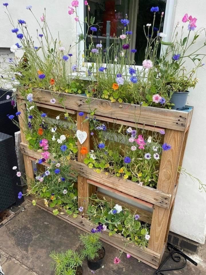 Whimsical Vertical Pallet Floral Display