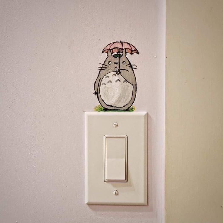 Adorable Totoro-Themed Light Switch Art